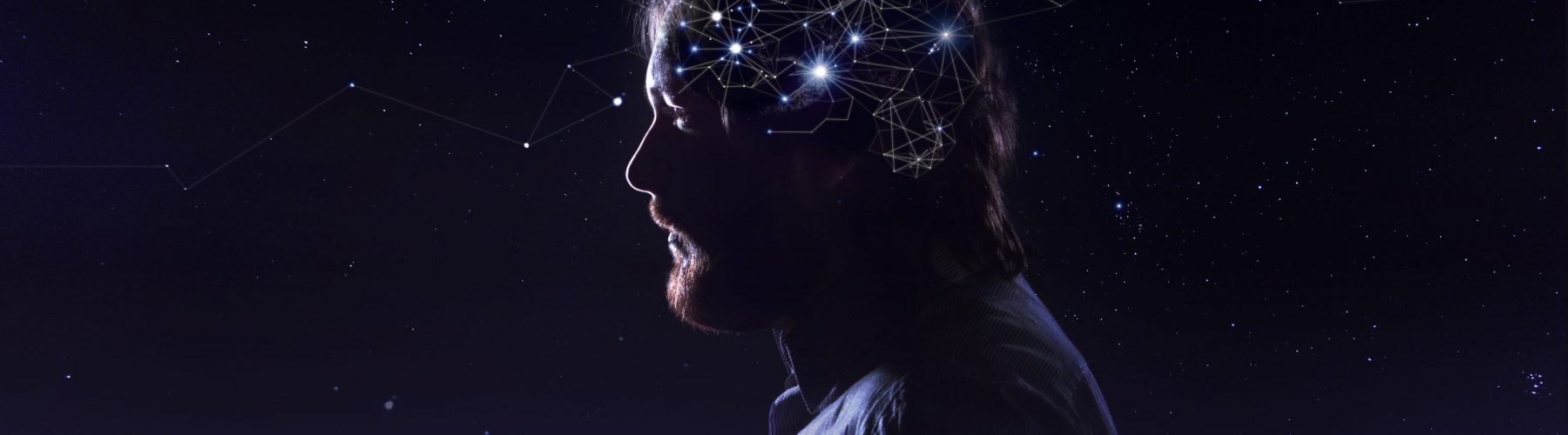 Profile of a bearded man head with a symbol of neurons in the brain